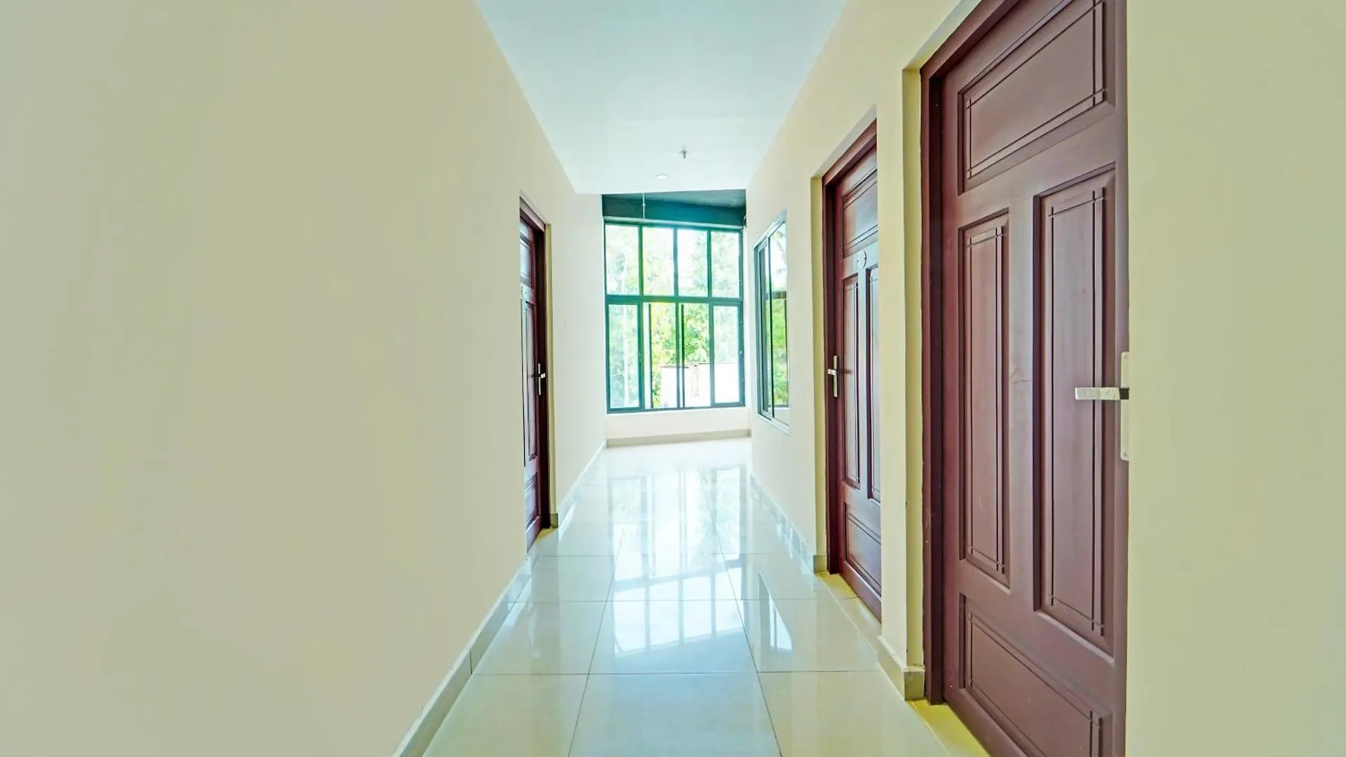 Hotel Super Collection O Kureepuzha Kollam